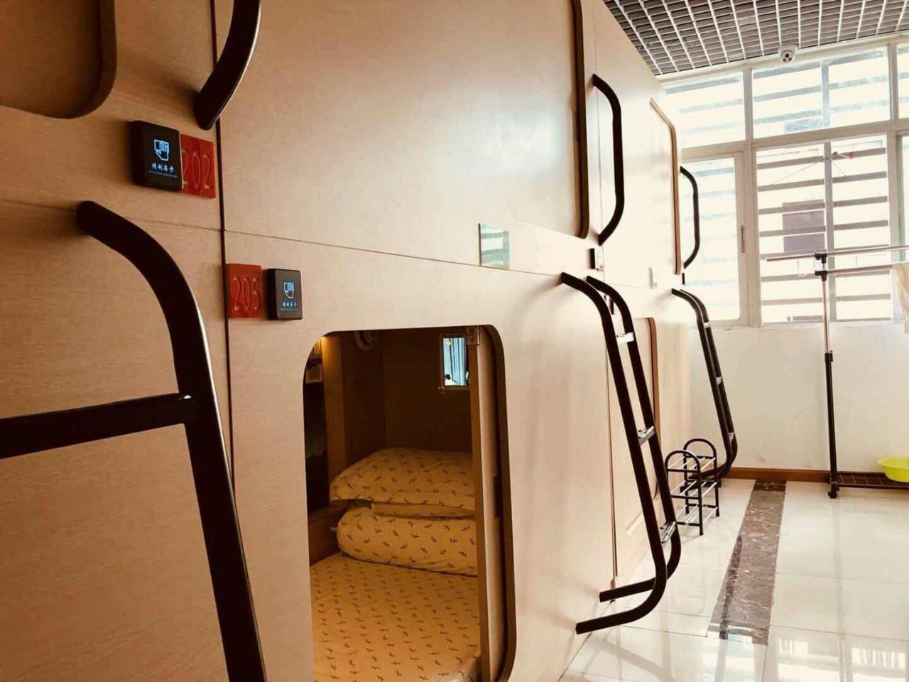 The Olive Tree Capsule Hostel Shenzhen Extérieur photo
